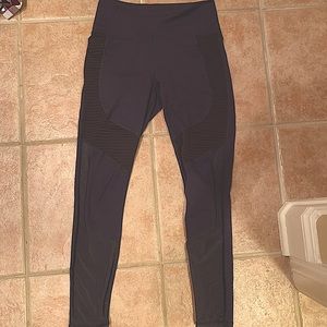 purple fabletics leggings with mesh and texture